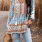 Tassel Tie Long Sleeve Peplum Blouse