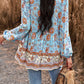 Tassel Tie Long Sleeve Peplum Blouse